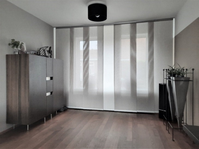 Transparant paneelgordijn woonkamer